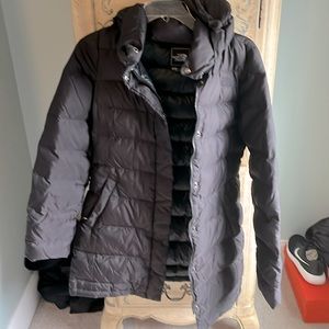 The North Face Small women’s hooded puffer jacket USED